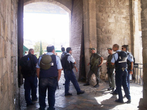 Israeli soldiers and police blocking Palestinians from one of the entrances to the old city in Jerusalem. Credit: Mel Frykberg/IPS