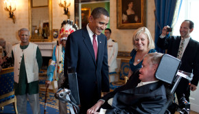 President Barack Obama talks with Stephen Hawking in the Blue Room of the White House before a ceremony presenting him and 15 others the Presidential Medal of Freedom, August 12, 2009.